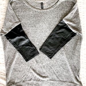 Divided faux leather sleeved sweater